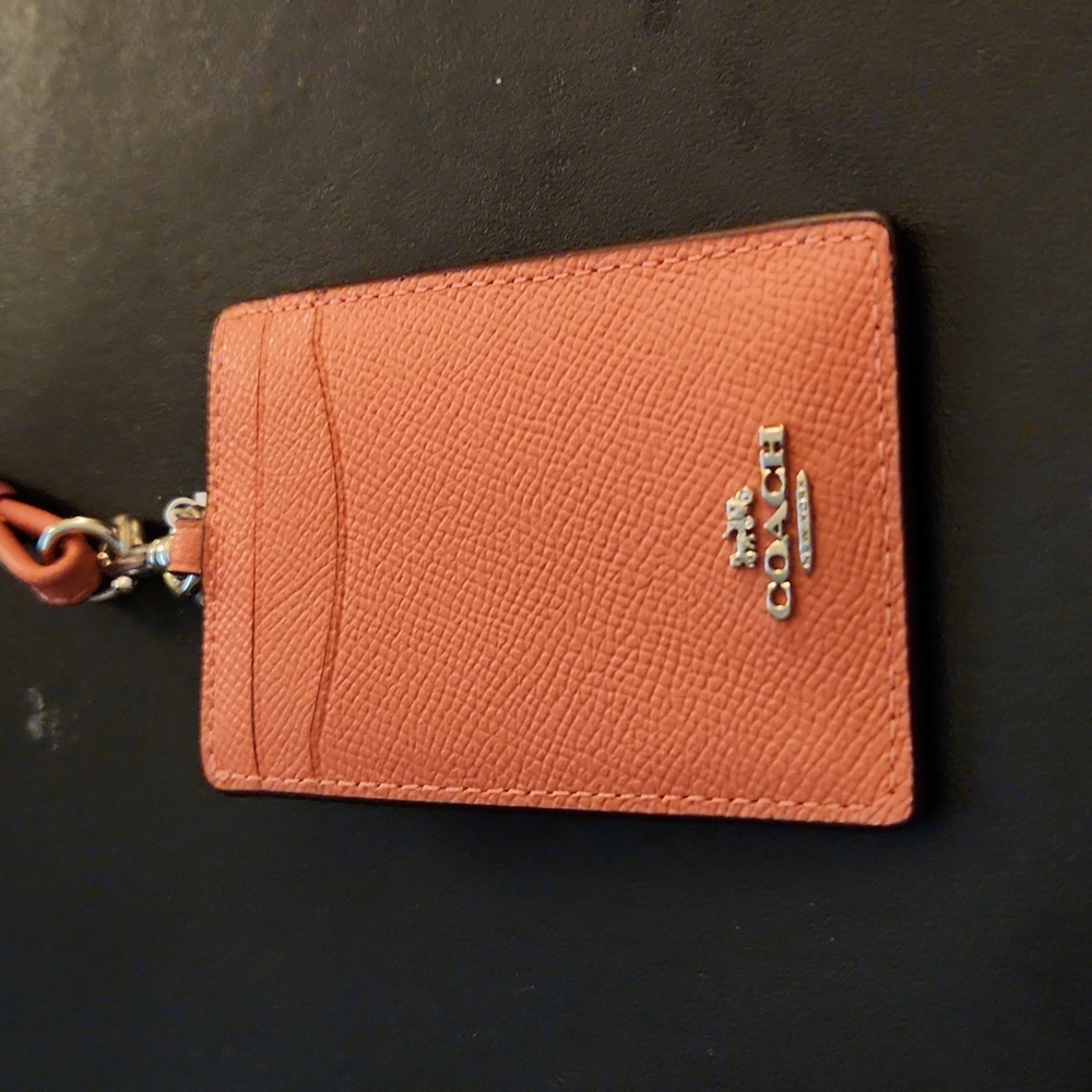NWT Coach ID lanyard.  Leather Coral color